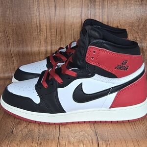 Jordan Kids Black, White, and Red Sneakers